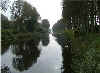 a nice picture of a quiet canal near bruges, the leopold canal